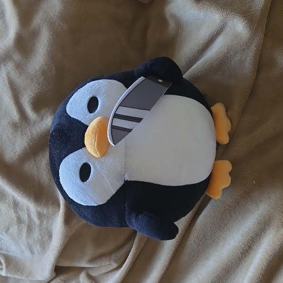 Hot Topic penguin with knife stuffed animal - Picture 1 of 3